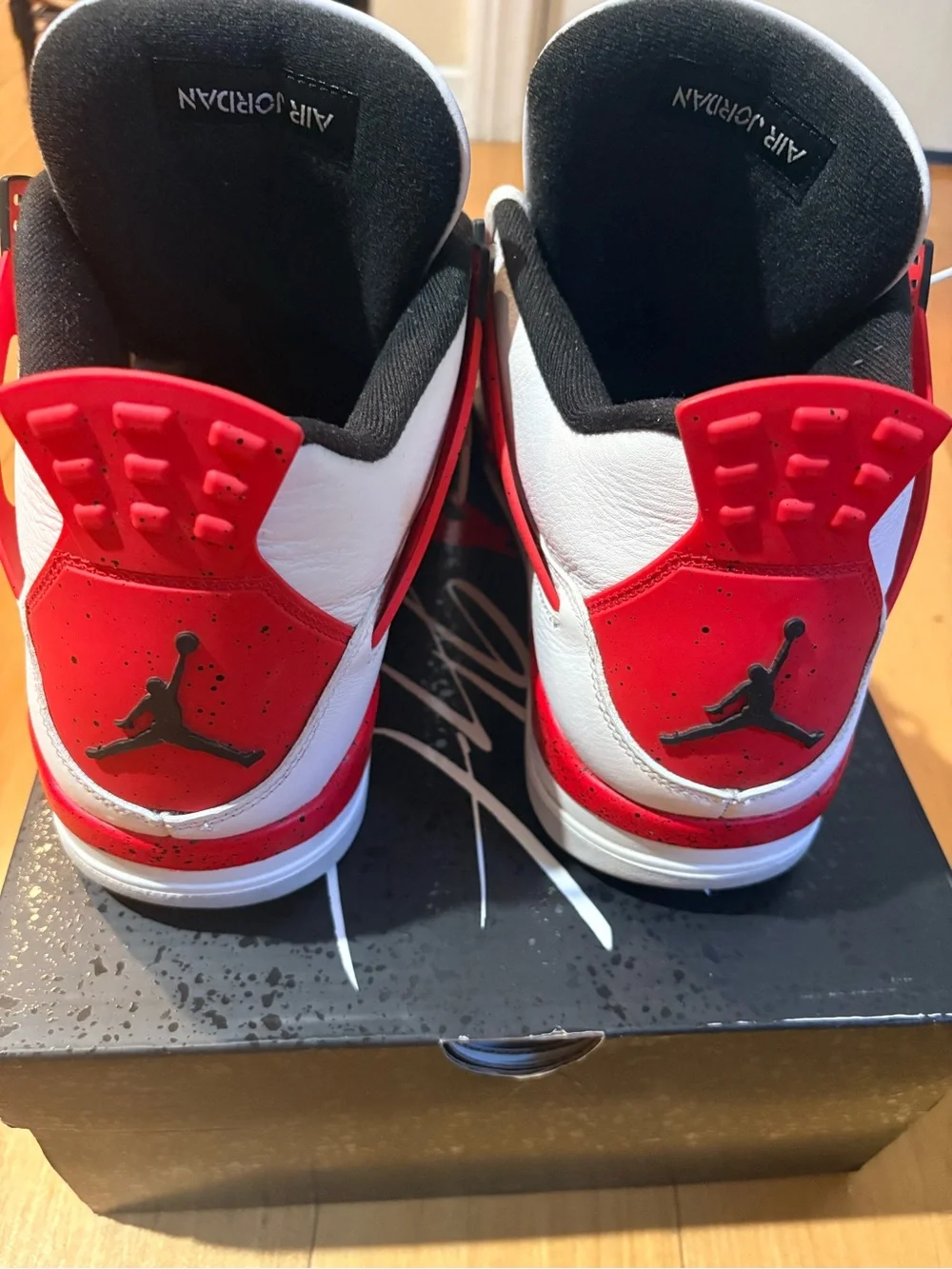Jordan men’s White/Black/Red Retro Sneaker